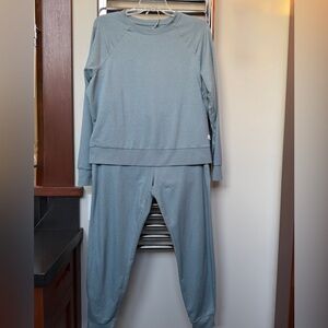 Pristine Vuori set. Performance Jogger and matching Halo Crew. Both size small.